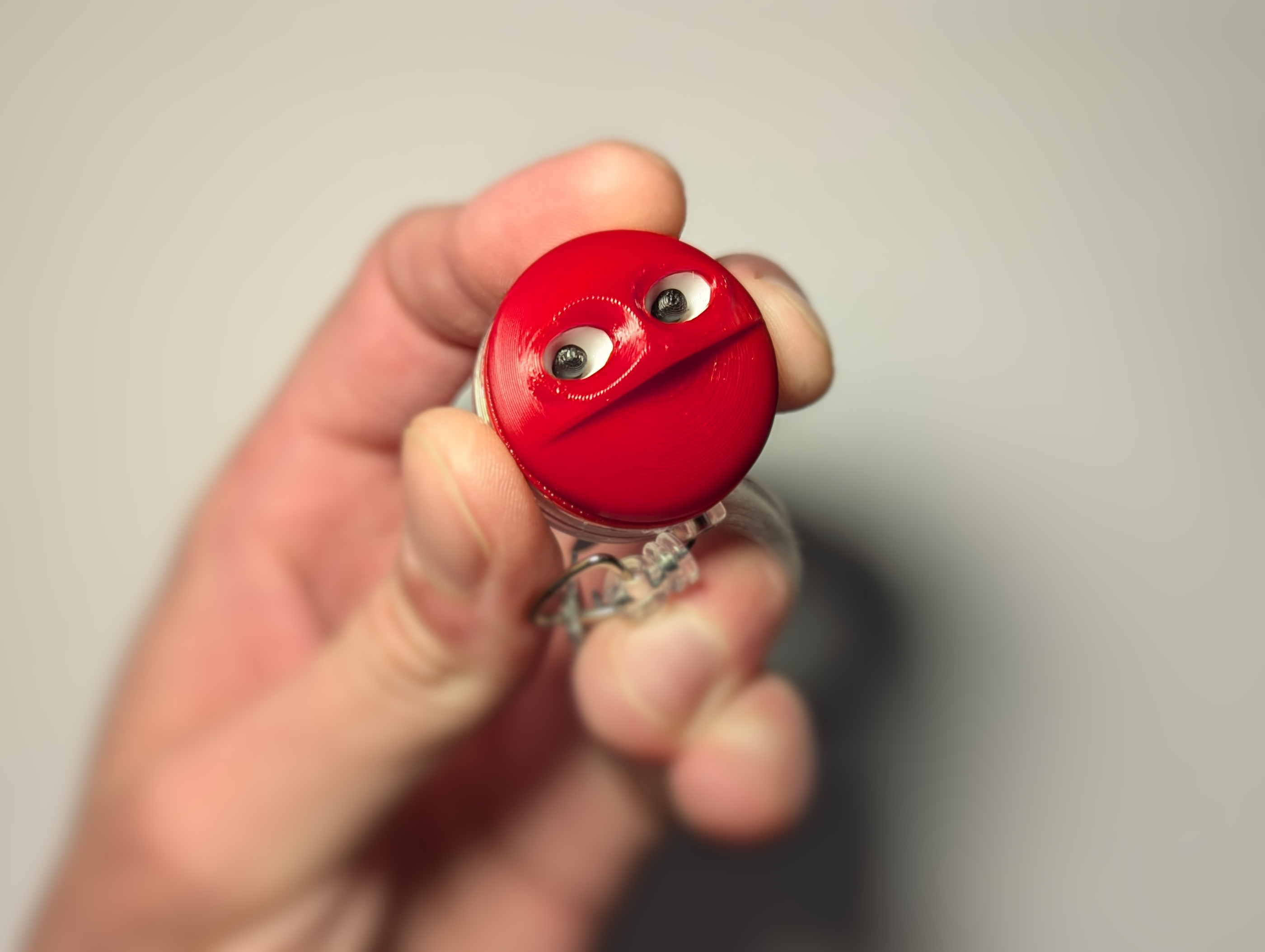 Always-Watching Badge Reel with Following Eyes