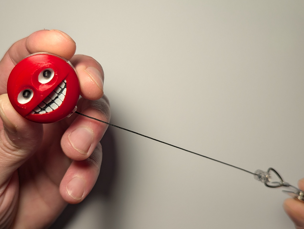 Always-Watching Badge Reel with Following Eyes